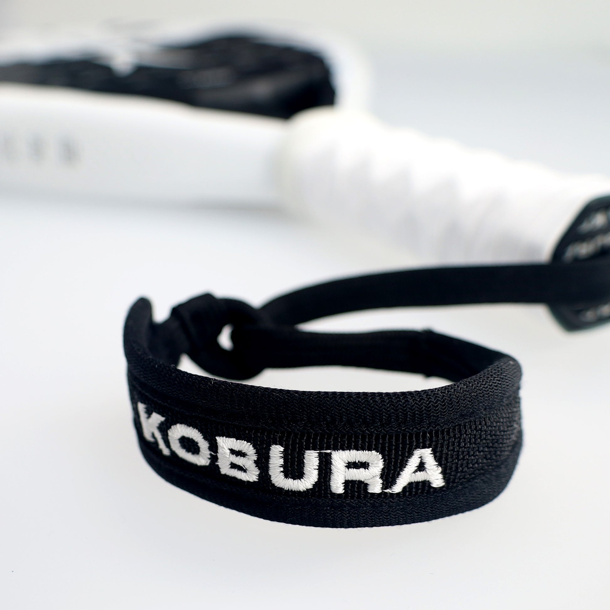 wrist band and strap of the kobura strike pro 12K padel racket